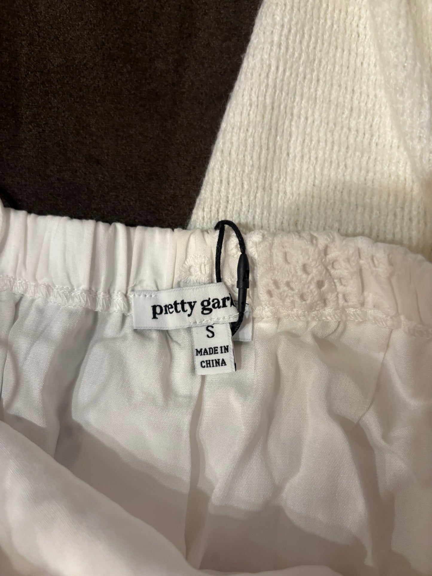 pretty garbage white top